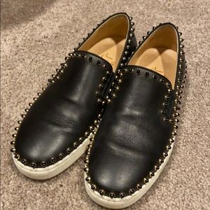 Christian Louboutin black stud slip ons